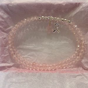 Avon Studio 1886 breast cancer stretch bracelet set with 2 charms